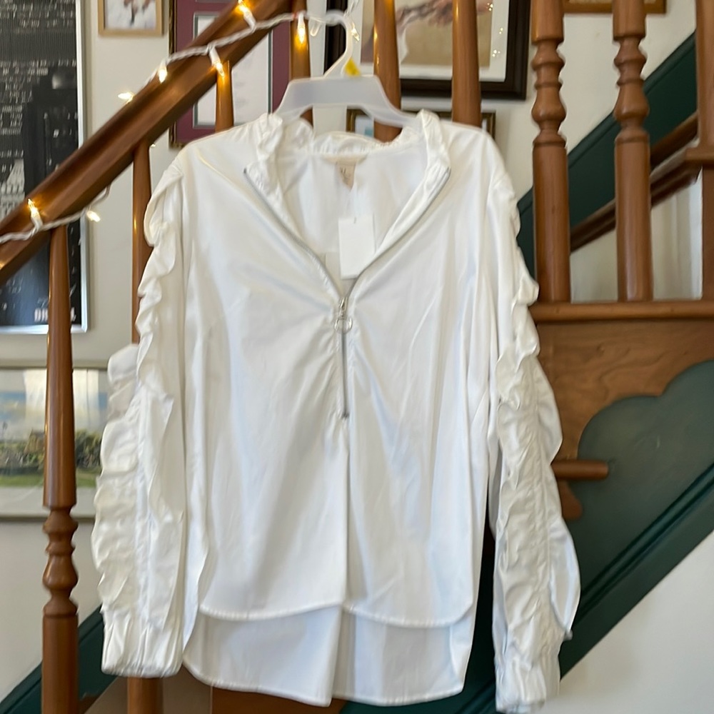 H&M white long sleeved ruffled blouse. Size 9. NWT.